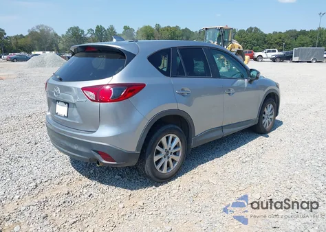 2015 Mazda Cx-5 Touring z USA, uszkodzony, nr VIN JM3KE2CY2F0440079